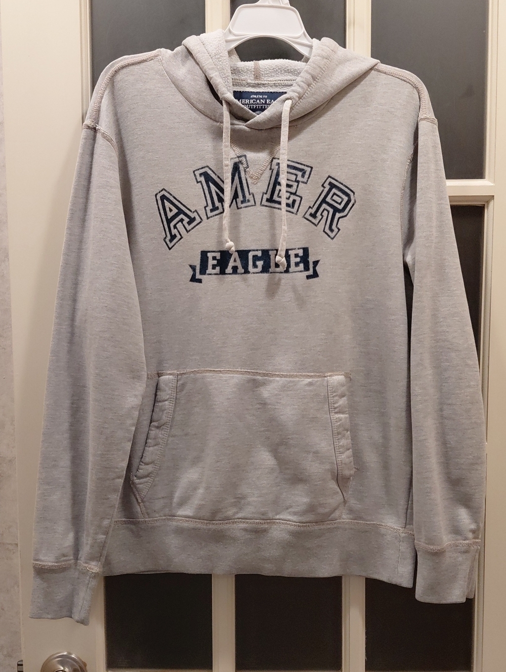 "American Eagle" Sz. M, Unisex,Oversized Light Gray Hoodie w/ Navy Logo.22in P2P